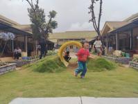 A kid playing in a park
