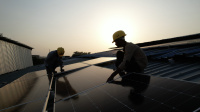 Men working on solar panels