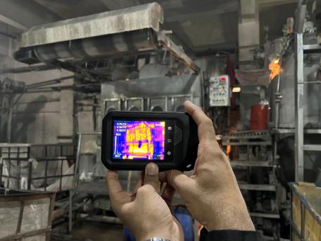Heat vision in a camera shows the temperatures in and around a machine at a textile MSME.