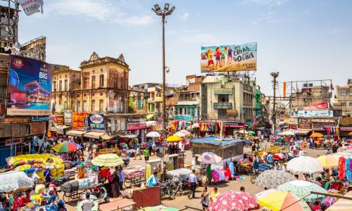 Aerial view of crowded street in Delhi, India. Photo by Finn Stock/Shutterstock.