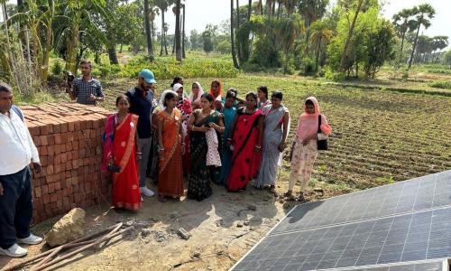 JEEViKA didis (SHG members) during a field visit to a house of a solar energy beneficiary. Photo by Purpose.