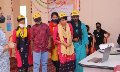 Adolescents engaged in sharing learnings and feedback using digital mediums. Photo by WRI India.