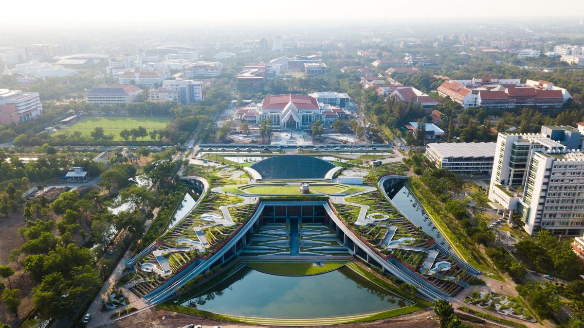 Thammasat University rooftop farm with cascading roof designed to slow down rainwater run-off, and form unique clusters of micro-watersheds along the terrace to help absorb, filter and purify rainwater while growing food for the campus Thammasat University rooftop farm with cascading roof designed to slow down rainwater run-off, and form unique clusters of micro-watersheds along the terrace to help absorb, filter and purify rainwater while growing food for the campus
